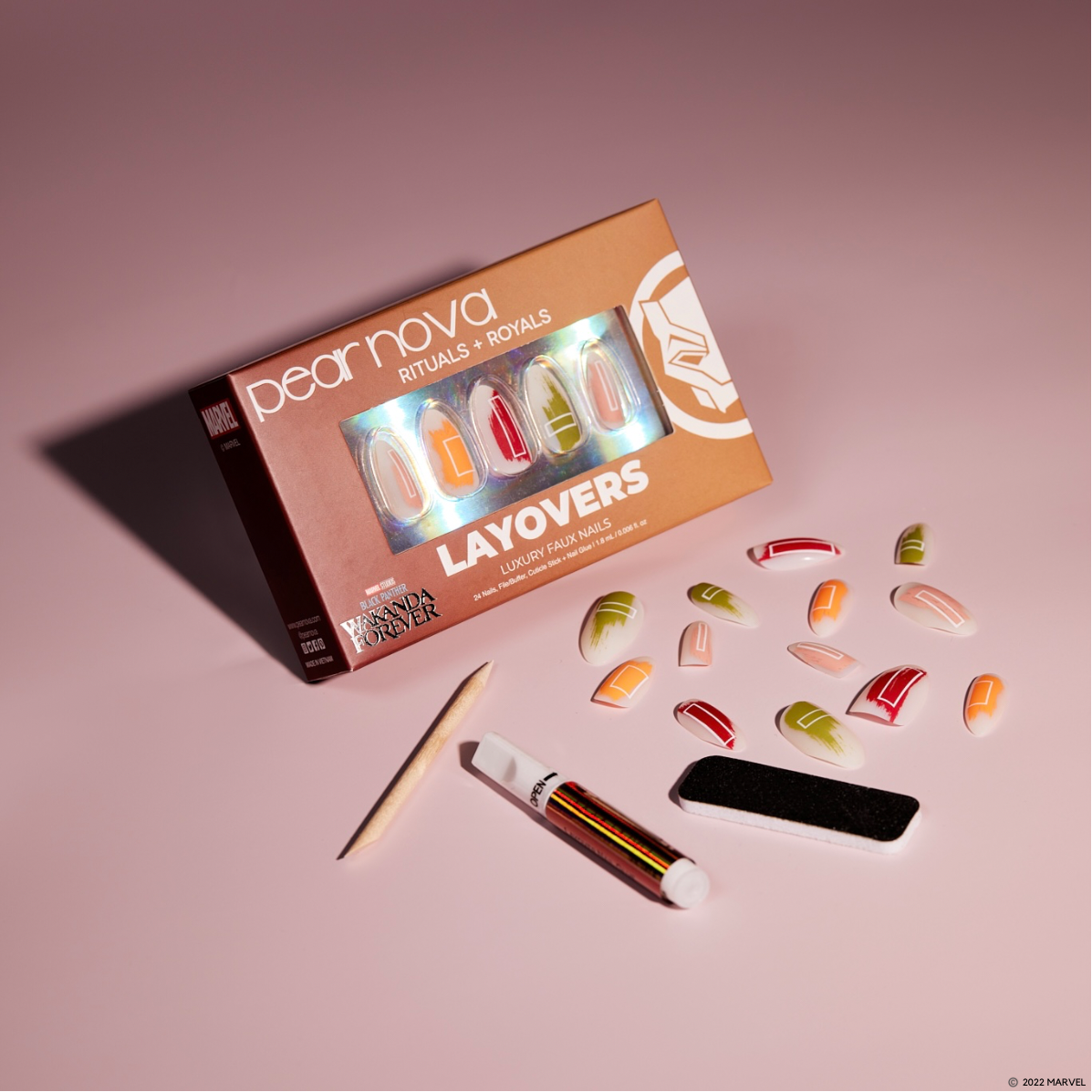 Box of Rituals + Royals showing all items included in box: faux nails, nail glue, cuticle stick and nail file/buffer